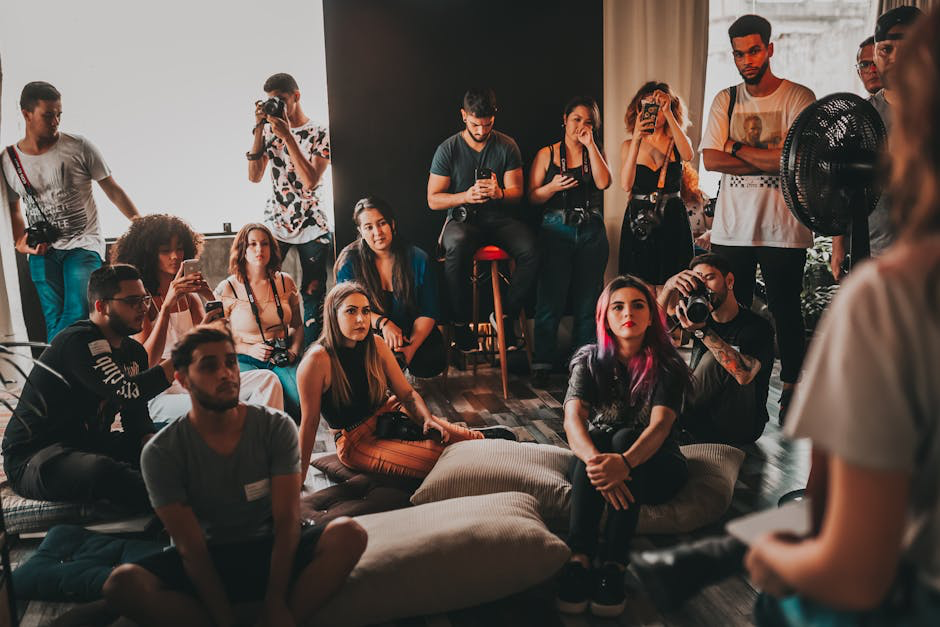 listing people on a dark floor