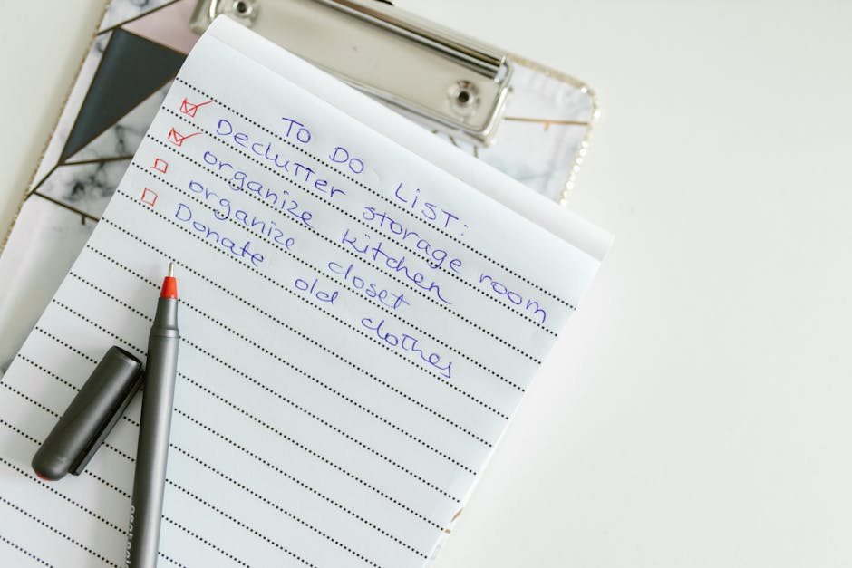 Handwritten to-do list on paper